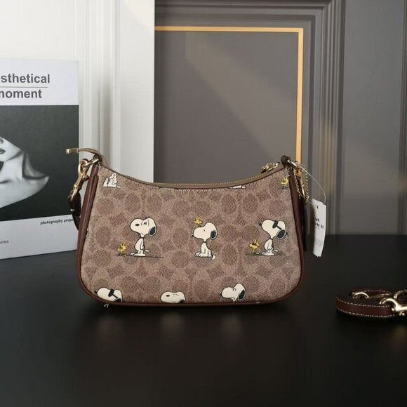 Coach X Peanuts Teri Shoulder Bag In Signature Canvas With Snoopy Print - Picture 1 of 6